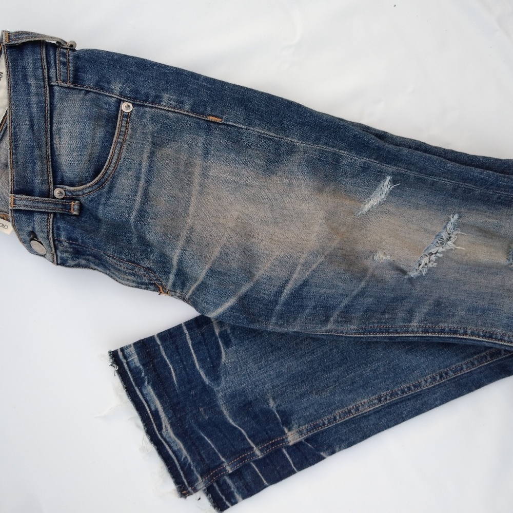 Ripped denims with light fray bottom